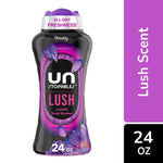 Bottle of Downy Unstopables Lush laundry scent booster with purple cap and label showing 'LUSH' and '24 oz'
