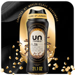 Black Downy Unstopables N.06 bottle with visible scent beads and gold accents on a dark luxe background.