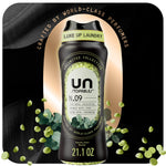 Black bottle of Downy Unstopables N.09 scent beads with eucalyptus visuals and scattered green beads