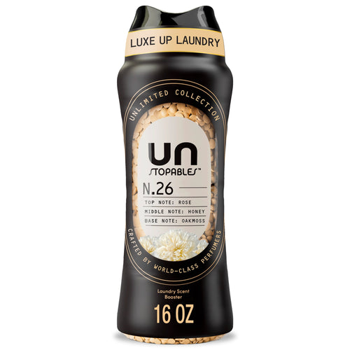 Black Downy Unstopables N.26 scent booster bottle showing beige fragrance beads and gold-accent label