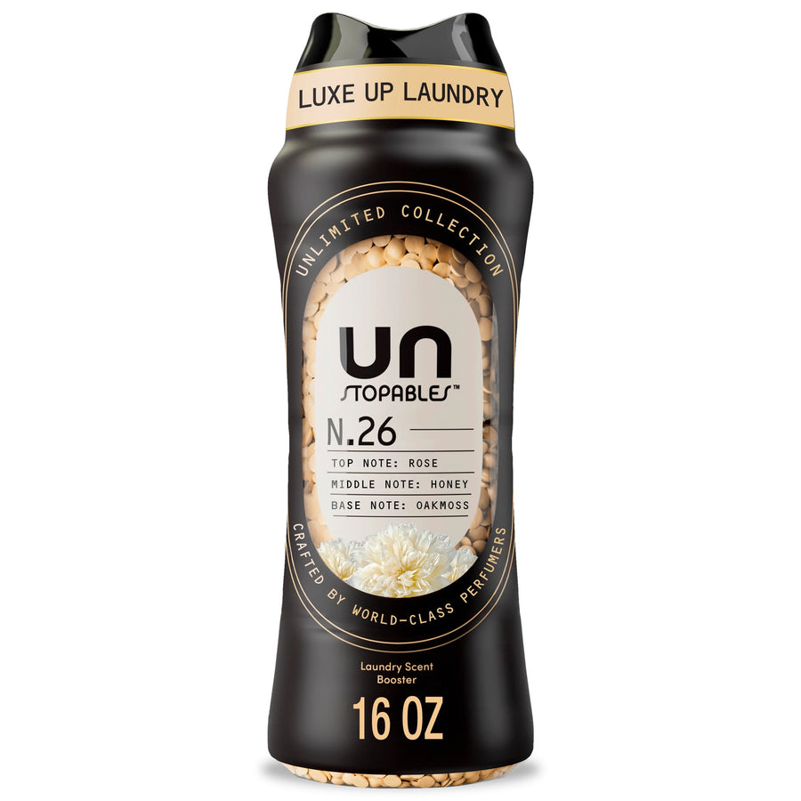 Black Downy Unstopables N.26 scent booster bottle showing beige fragrance beads and gold-accent label