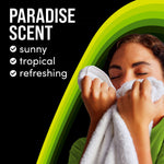 Lifestyle/infographic showing person smelling a towel next to text 'PARADISE SCENT' with checkmarks for sunny, tropical, refreshing