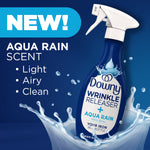 Promotional image of Downy Wrinkle Releaser Aqua Rain bottle splashing in water with 'NEW! Aqua Rain scent' text