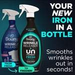 Promotional graphic showing two Downy Wrinkle Releaser bottles with bold text 'Your new iron in a bottle' on dark teal background