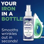 Downy Wrinkle Releaser Crisp Linen spray bottle on blue background with text 'Your iron in a bottle' and an iron illustration