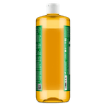Rear-quarter view of a clear amber Dr. Bronner's almond soap bottle with visible green label panels and white cap.