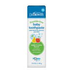 Rectangular retail box of Dr. Brown's fluoride-free baby toothpaste showing apple and pear graphics and product labeling.