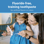 Parent and child at sink holding toothpaste and toothbrush with header text about fluoride-free training toothpaste