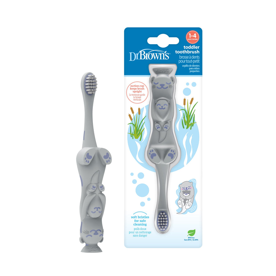 Gray otter-shaped toddler toothbrush shown next to its blister card packaging