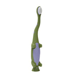 Standalone Dr. Brown's green dinosaur toddler toothbrush with soft bristles and purple grip panels