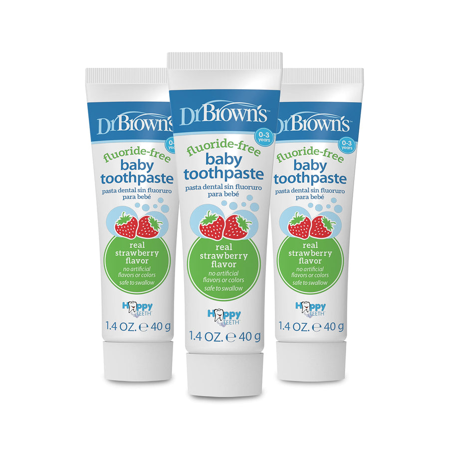Three tubes of Dr. Brown's fluoride-free baby toothpaste with strawberry graphics on white background