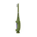 Side profile of Dr. Brown's green dinosaur toddler toothbrush showing bristles, textured handle and suction-base