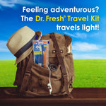 Dr. Fresh travel kit packed into an open backpack beside a hat and camera, with text promoting the kit as lightweight for travel.
