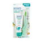 Blister pack containing Dr. Talbot's toddler training toothpaste tube and green alligator-shaped toothbrush
