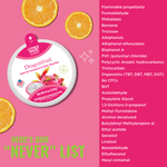 Citrus Magic Dragonfruit air freshener tin positioned next to a vertical 'never list' of excluded ingredients on pink background