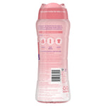 Rear view of a pink Dreft Blissfuls bottle with usage instructions, barcode and product text on the back label.