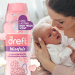 Close-up Dreft Blissfuls bottle next to a parent holding a newborn, highlighting 'Long Lasting Baby Fresh Scent' badge