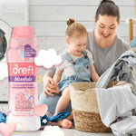 Lifestyle image of Dreft Blissfuls bottle beside a mother and child near a laundry basket, product graphic emphasized