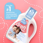 Angled Dreft Family detergent bottle showing label claims and Safer Choice badge on a pink graphic background