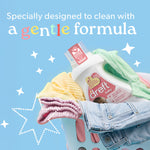 Dreft detergent bottle in a laundry basket with folded baby clothes and gentle formula headline