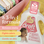 Close-up of Dreft baby detergent bottle beside folded baby clothes with 3-in-1 formula text