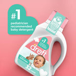 Dreft detergent bottle on pink background with '#1 pediatrician recommended baby detergent' callout