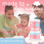 Lifestyle image showing parents and child making a mess with a Dreft wipes tub pictured and 'made to clean surfaces' headline