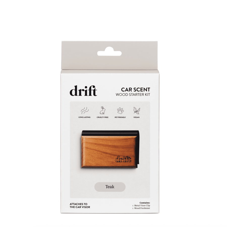 White retail box front for Drift car scent wood starter kit showing a teak wood air freshener and product name