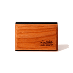 Close-up studio photo of a rectangular teak wood car freshener with the drift logo burned into the wood