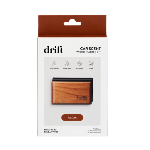 Drift wood car scent starter kit in retail box showing amber wood clip image on front