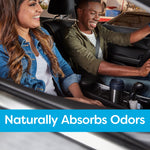 Smiling driver and passenger in a car interior with banner reading Naturally Absorbs Odors