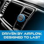 Blue DRVN round vent clip attached to a car air vent shown close up on a dashboard