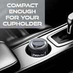 Lifestyle-style image of a DRVN gel can placed in a vehicle cupholder with overlay text 'Compact enough for your cupholder'.
