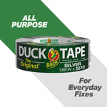 Duck Tape silver duct tape roll with green label reading ‚The Original‘ and product dimensions on a diagonal green/gray background