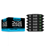 DUDE Wipes retail box displayed alongside six individual black XL wipe packets on a white background