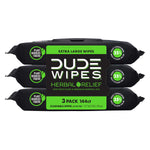 Three-pack bundle of DUDE Wipes Herbal Relief in black packaging with green label shown in a studio white background.