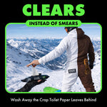 Lifestyle image of a person in snowy mountains receiving a DUDE Wipes pack from another hand with large green headline text.