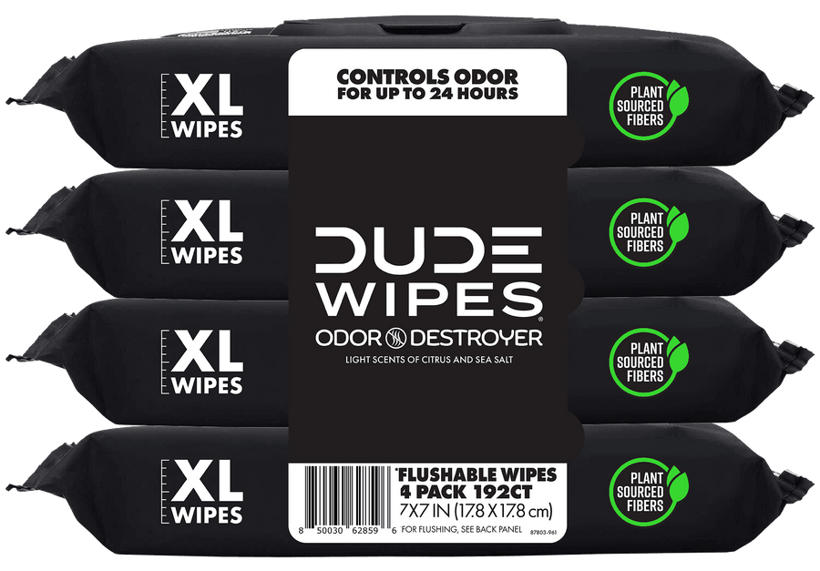 Four stacked black DUDE WIPES Odor Destroyer XL packs with visible brand label and plant-sourced fibers badge
