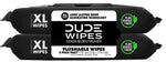 Close-up of two black DUDE Wipes Odor Destroyer XL flushable wipes packs side by side showing the central label.
