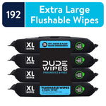 Stacked four-pack of black DUDE Wipes XL flushable wipes packaging with blue label and plant-sourced fiber icons