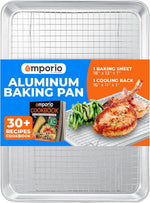 Emporio-branded aluminum baking sheet and stainless steel cooling rack shown with packaging graphic and cookbook image