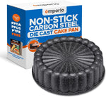 Speckled black marble fluted nonstick cake pan shown in front of Emporio branded retail box with product text