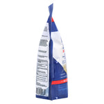 Angled side view of an Enoz Roach Away pouch showing safety and usage text on the package against white background