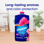 Ensueño Max Spring Fresh fabric softener bottle staged in a laundry room setting with headline about long-lasting aromas
