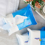 open pack of equate flushable wipes labeled 48 wipes on a bathroom counter with additional packs nearby