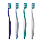 Four Equate manual toothbrushes in a row showing varied colored handles and angled bristle heads on a white background