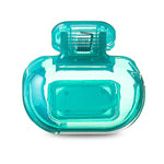 Teal translucent clip-on toothbrush protector pod shown on white background, top clamp visible