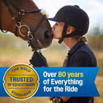 Equestrian kissing a horse in a promotional banner with a badge and text celebrating over 80 years of the brand