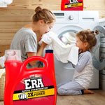 Mother and child smelling a fresh towel beside a washing machine with ERA detergent bottle in foreground