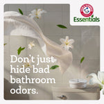 Lifestyle graphic showing a toilet with an Arm & Hammer Essentials disk air freshener and floating lilies and leaves